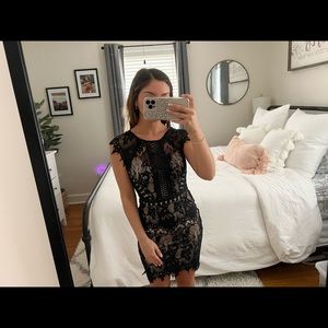 Black lace dress with a nude slip attached underneath, Zipper back